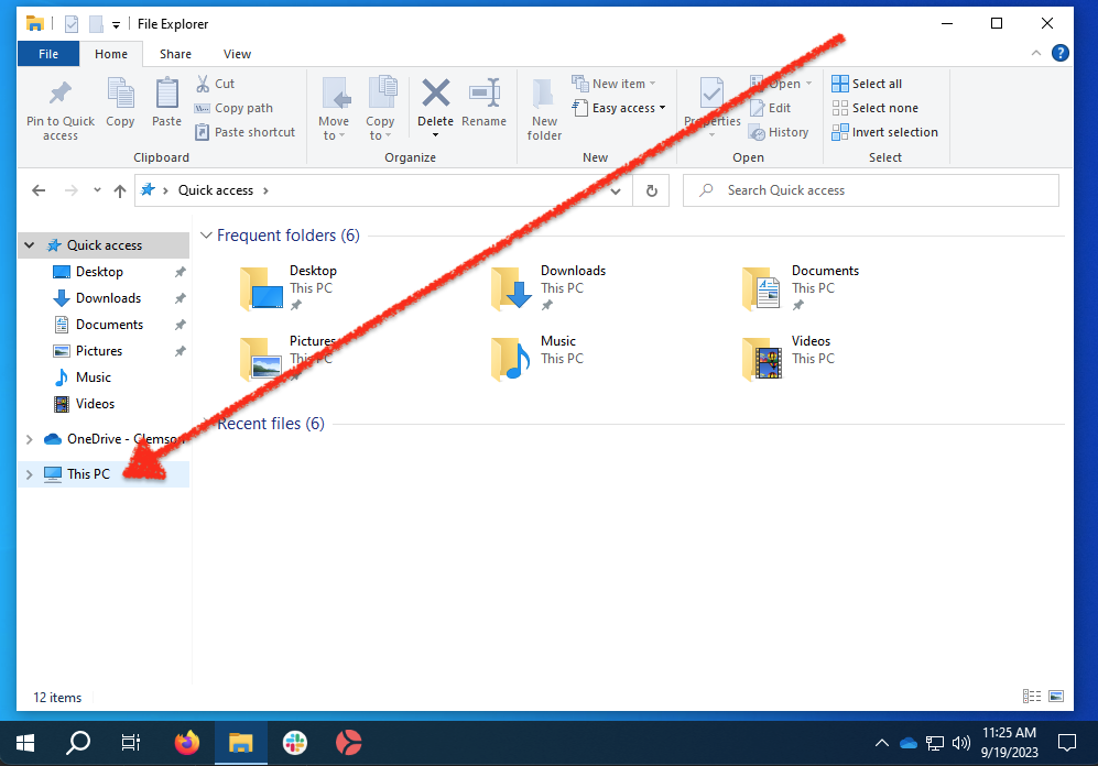 Screenshot of the file explorer app with an arrow pointing towards the this PC option in the directory sidebar.